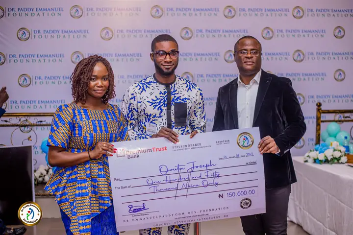 A young entrepreneur receiving a grant at Advance