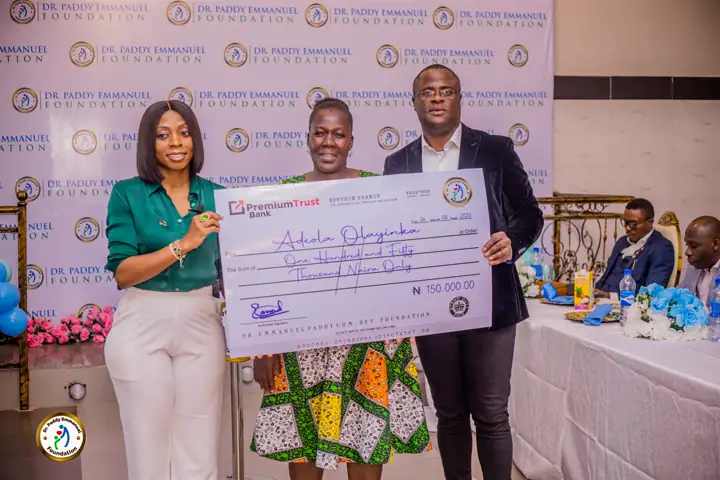 A presenter with grant recipients