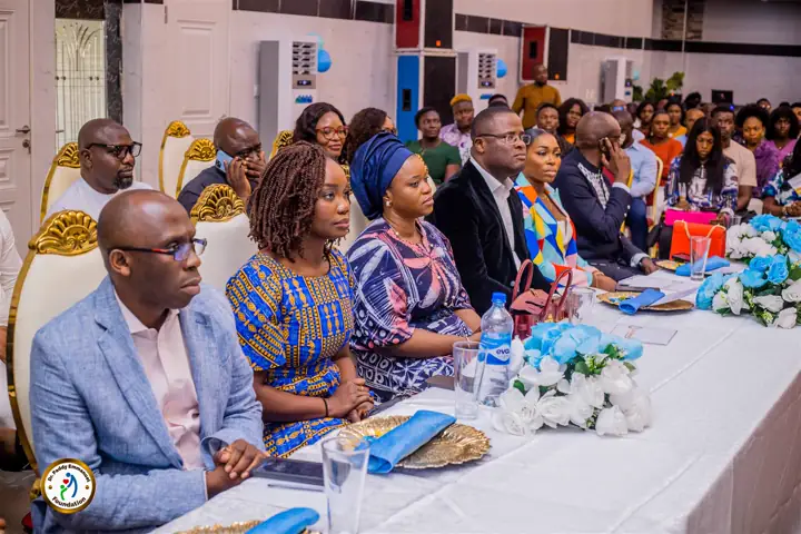 A packed Advance audience and panel table