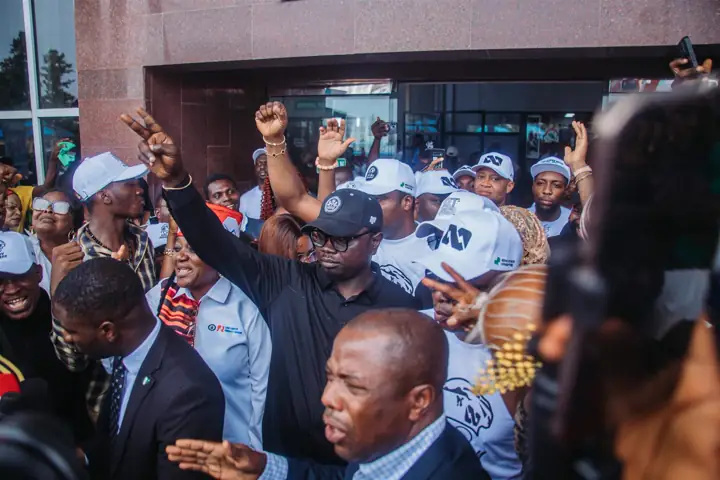 Dr Paddy Iyamu greeting the crowd